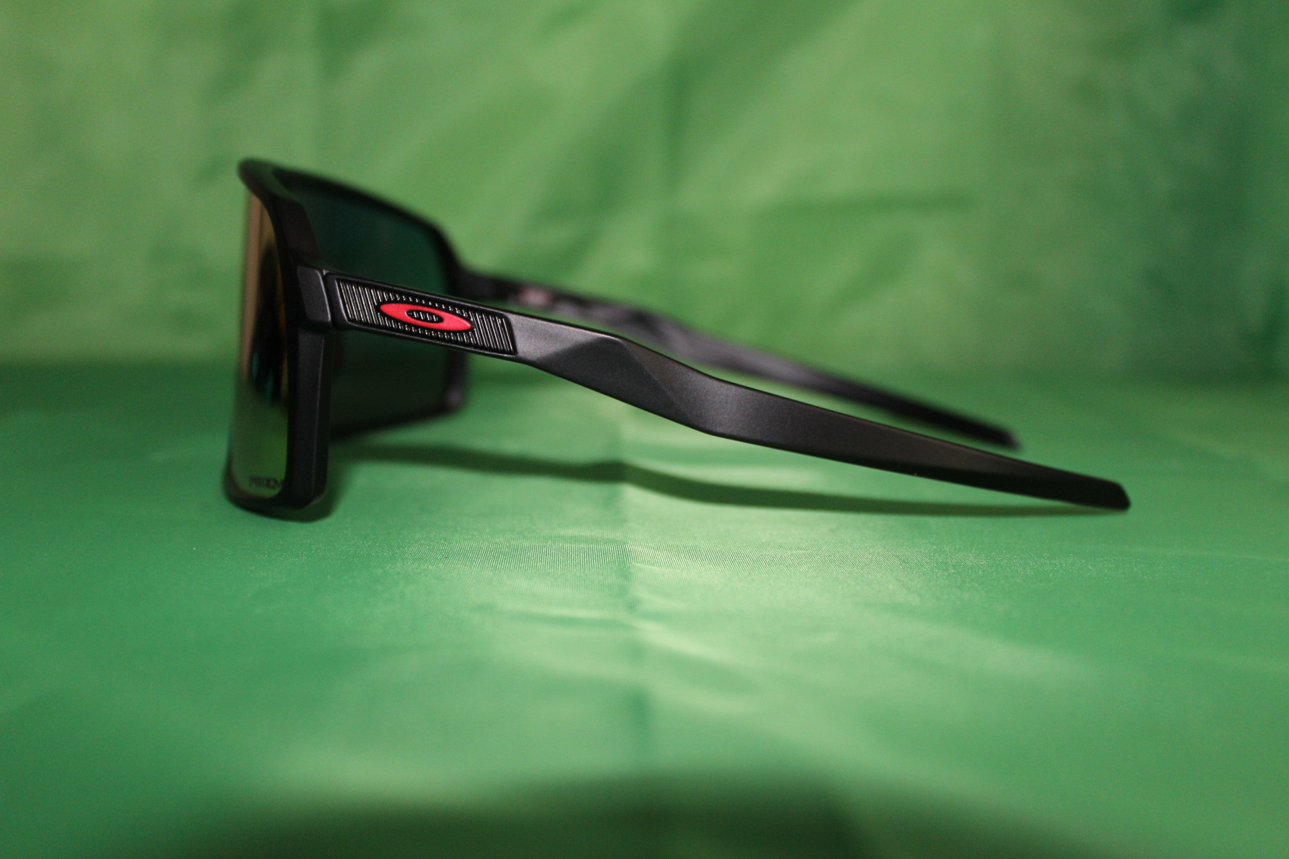 Black and store green oakleys