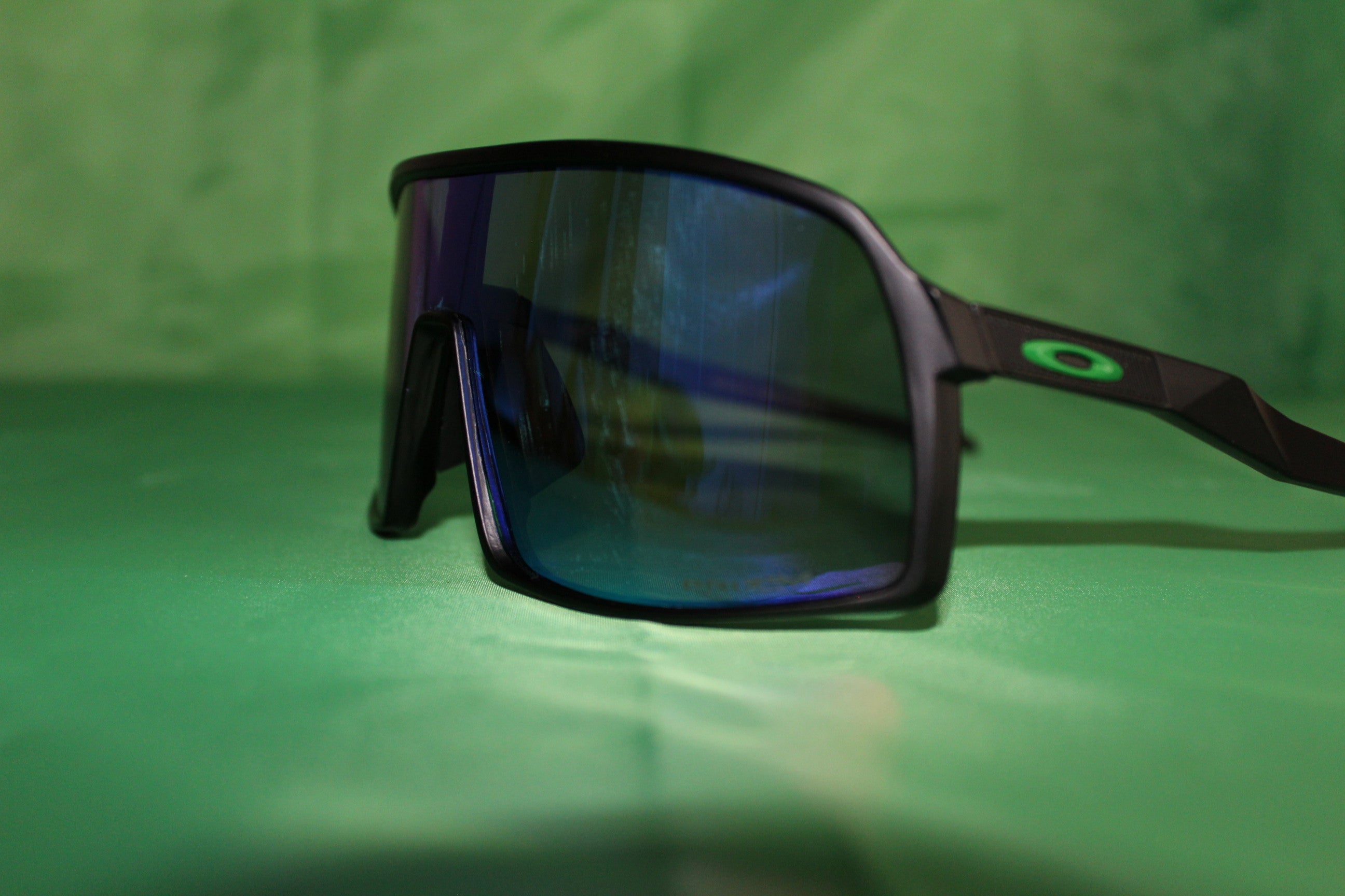 Black and shop green oakleys