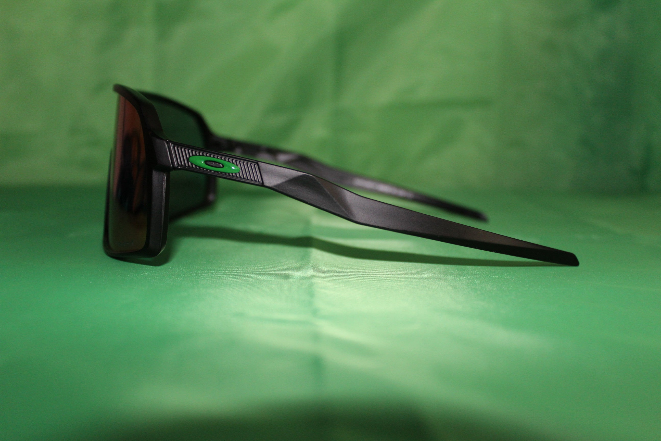 Black and store green oakleys